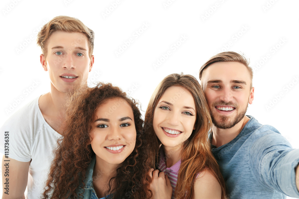 Young cheerful friends taking selfie isolated on white Young cheerful friends taking selfie isolated on white