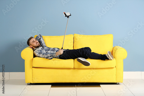 Young handsome man taking s...