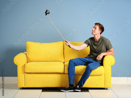 Young handsome man taking s...