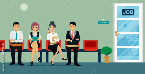 Workers are sitting waiting for a job interview.