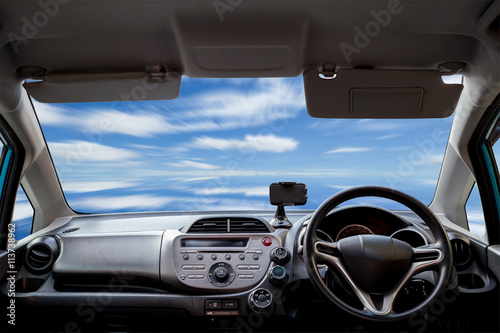 Fototapeta Naklejka Na Ścianę i Meble -  Car dashboard speeds while on the sky background.
