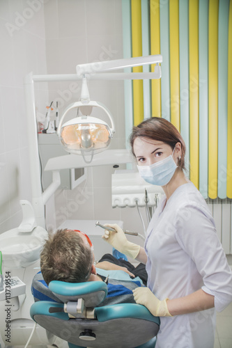 young woman doctor in a dental clinic