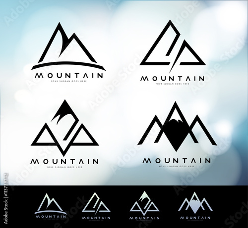 Retro Vintage Mountain Logo with blurred background. Mountain Linear Logo Design. photo