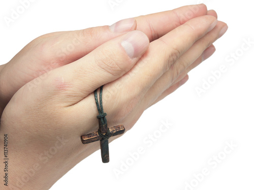 hand holding a cross