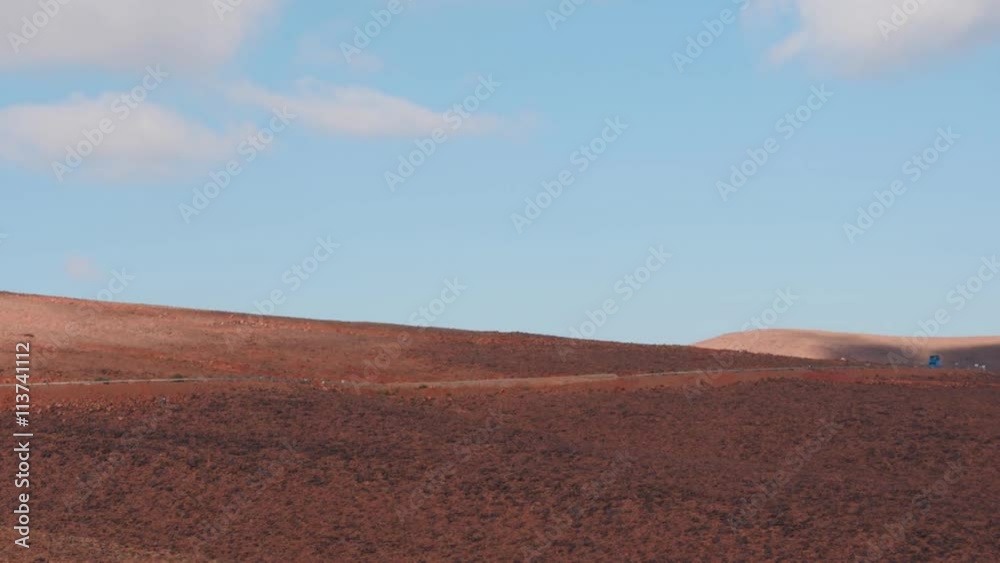 Sahara desert in Morocco with motion on road time lapse Sahara desert in Morocco with motion on road time lapse