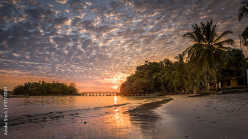 Sunrise on tropical beach, Isla Coiba, Panama