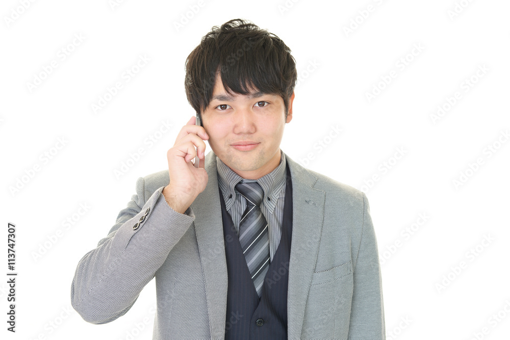 通話中のビジネスマン 通話中のビジネスマン