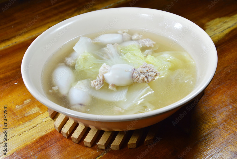boiled minced pork stuffed squid with Chinese cabbage hot soup in bowl boiled minced pork stuffed squid with Chinese cabbage hot soup in bowl