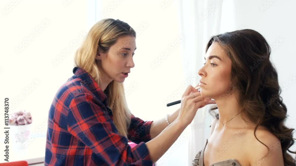 A young girl in a beauty salon make-up A young girl in a beauty salon make-up