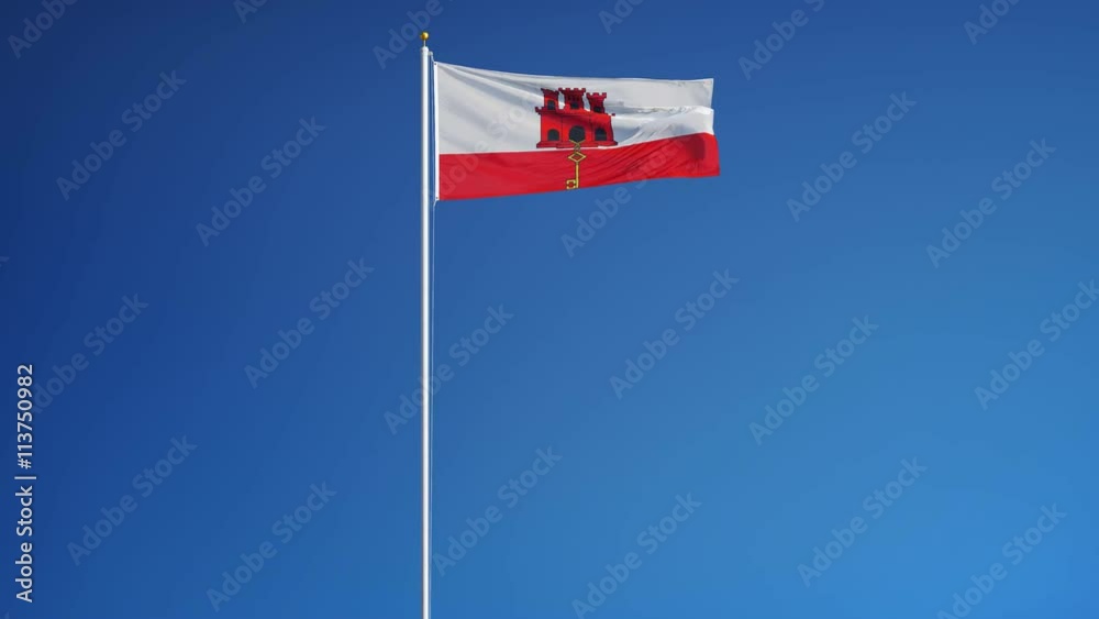 Gibraltar flag waving in slow motion against clean blue sky, seamlessly looped, long shot, isolated on alpha channel with black and white luminance matte, perfect for film, news, digital composition