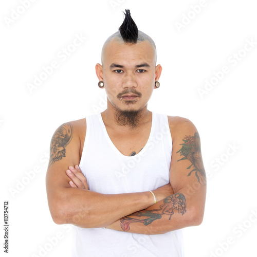 portrait of angry, mad asian punk guy with mohawk hair style, pi