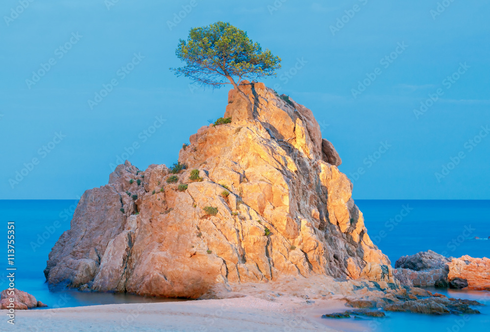 Tossa de Mar. The rock on the shoreline.