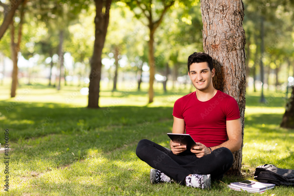 University student with tablet. University student with tablet.