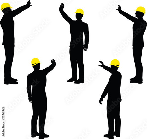 worker silhouette with yellow protective headgear