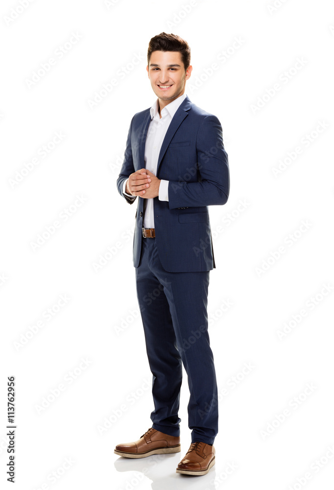 Handsome young man posing on white background. Handsome young man posing on white background.