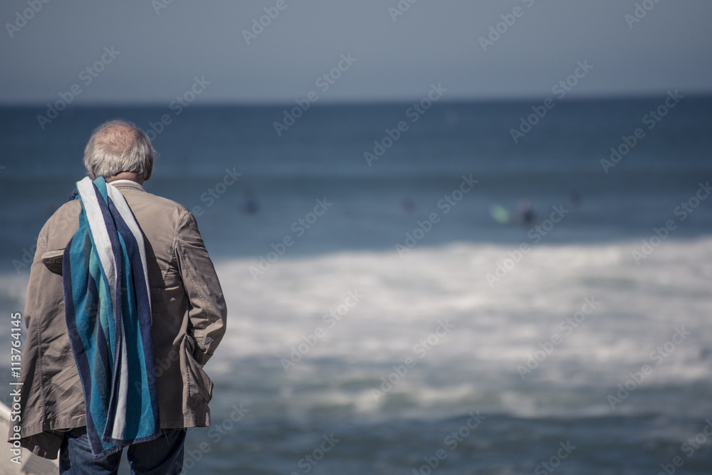 old man checking waves