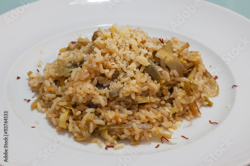 Brown rice with carciofi and cheese.