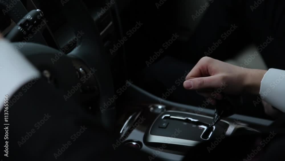 Man in black sitting in the car. Man in black sitting in the car.
