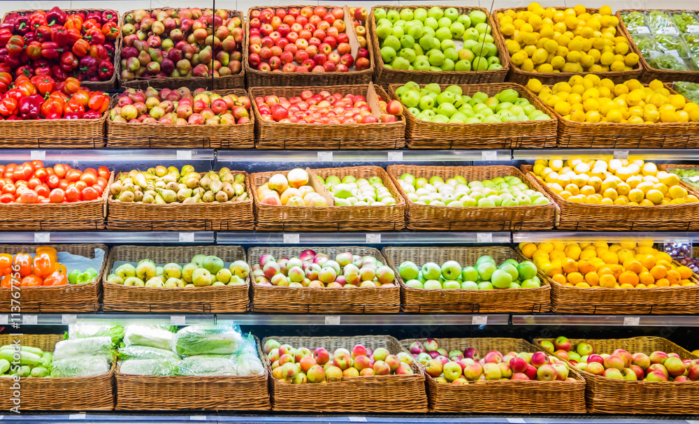 Fresh fruits and vegetables on shelf in supermarket