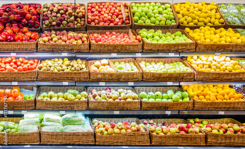 Fresh fruits and vegetables on shelf in supermarket © fascinadora