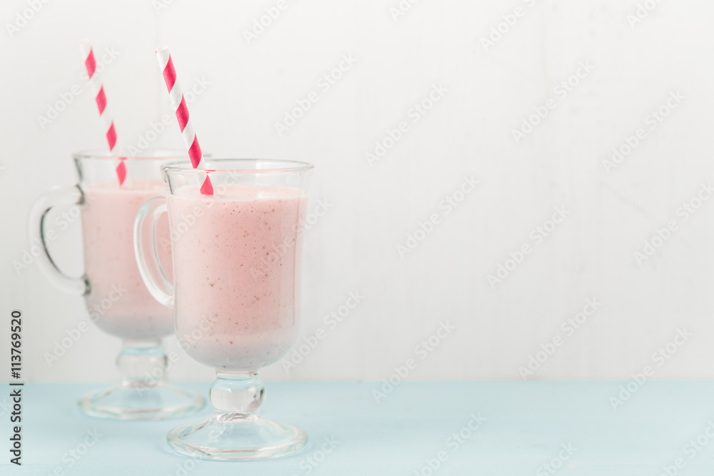 Two ice-cream pink cocktails with strawberries Two ice-cream pink cocktails with strawberries