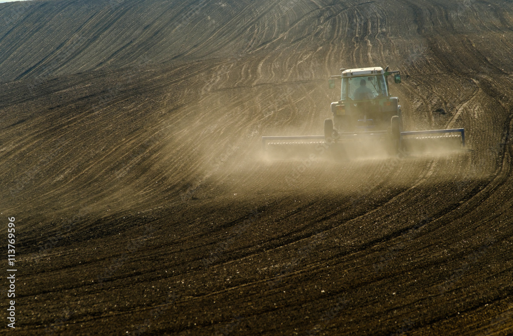 Fototapeta premium Agricultural tractor working