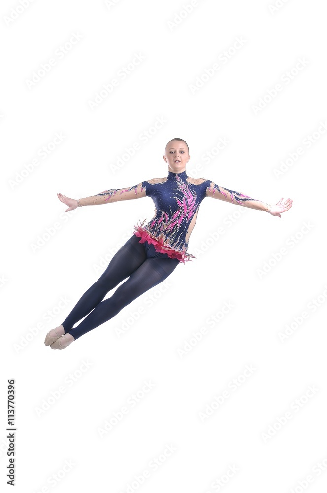 Beautiful artistic female gymnast working out, performing art gymnastics element