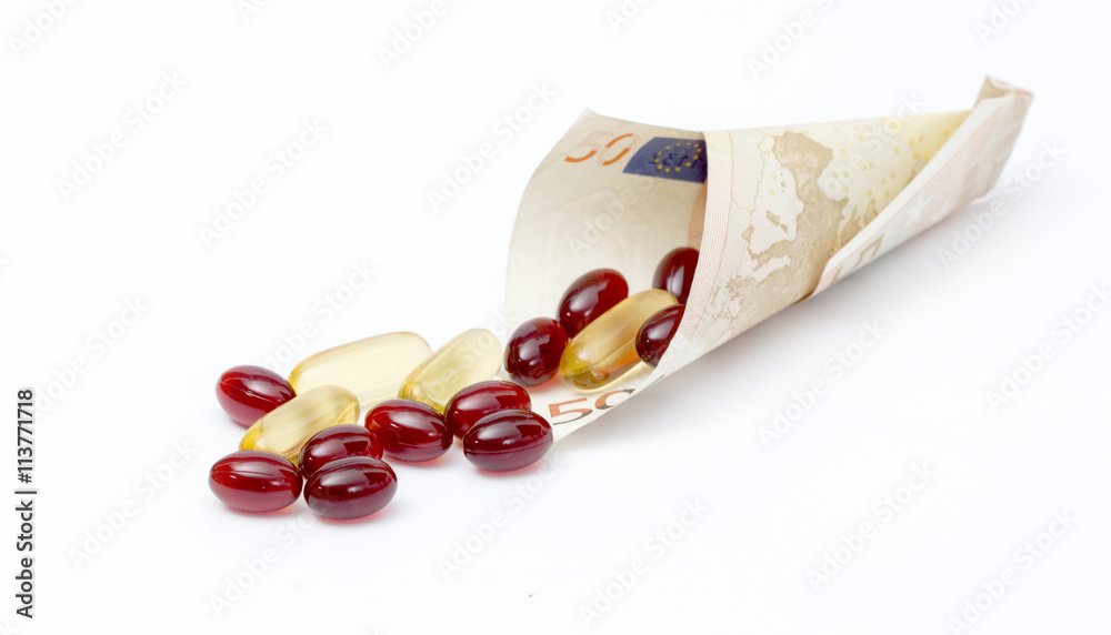 Krill oil capsules,spill out from euro banknote Krill oil capsules,spill out from euro banknote