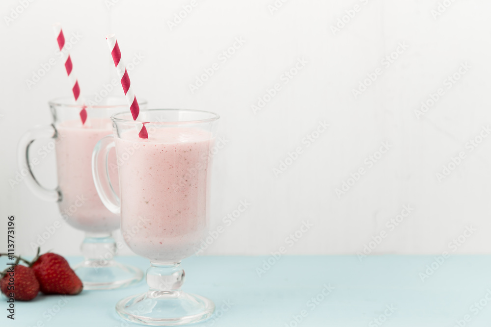 Two ice-cream pink cocktails with strawberries Two ice-cream pink cocktails with strawberries