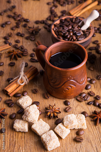 grains of black coffee and black coffee