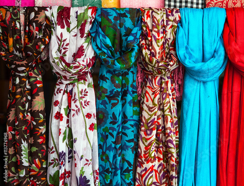 Colorful scarves at a market in India.