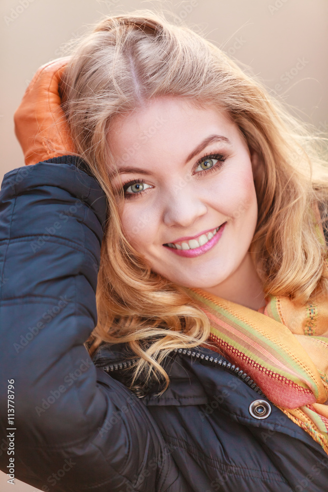 Portrait of pretty smiling woman in jacket. Portrait of pretty smiling woman in jacket.