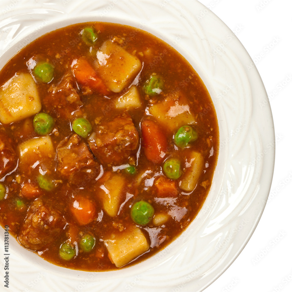 Slow Cooker Beef Stew Isolated on white. Selective focus. Slow Cooker Beef Stew Isolated on white. Selective focus.