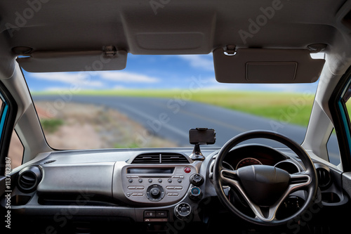 Car dashboard speeds while on the road © panya99