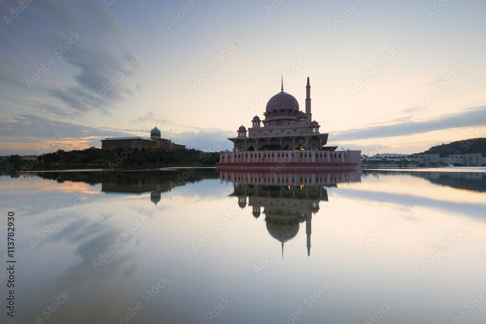 A very serene morning and beautiful reflection of a mosque.