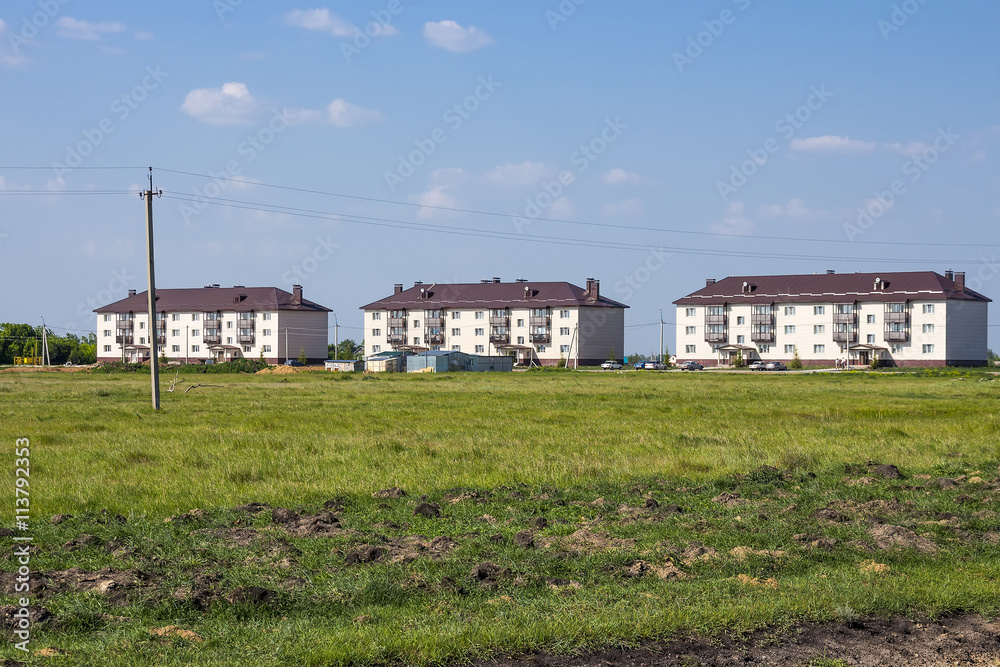 New modern three-storied apartment house New modern three-storied apartment house