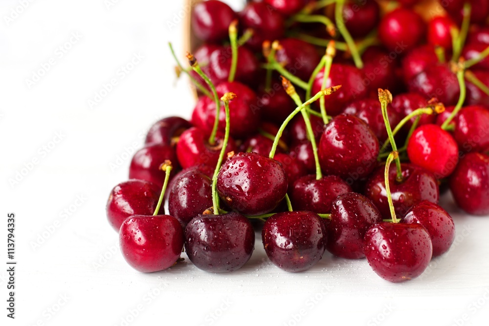 tasty juicy ripe cherries on a wooden background,selective focus tasty juicy ripe cherries on a wooden background,selective focus