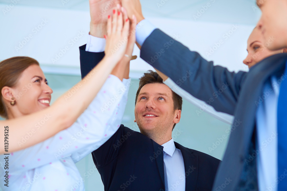 Business team joining hands together Business team joining hands together