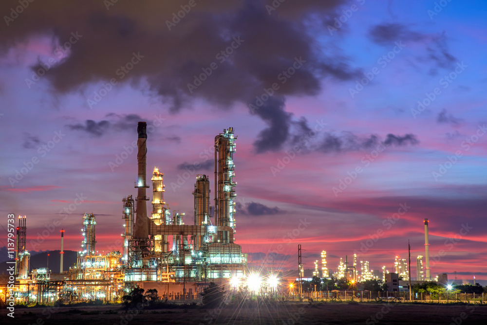 Overall view of an oil and gas refinery, pipelines and towers, heavy industry