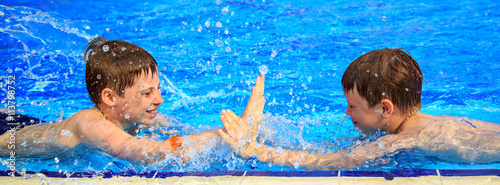 Children swimming in the pool