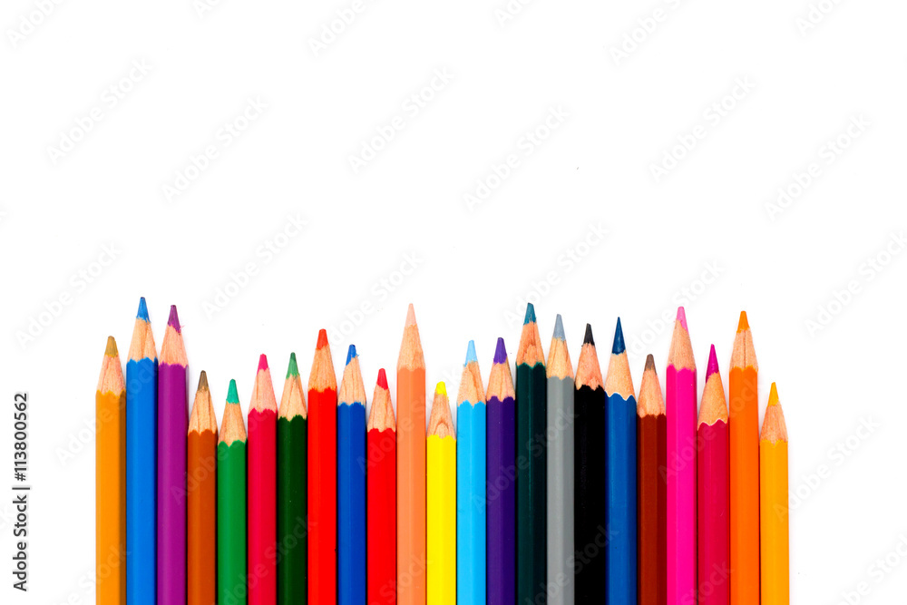 Row of color pencil placed on white background Row of color pencil placed on white background