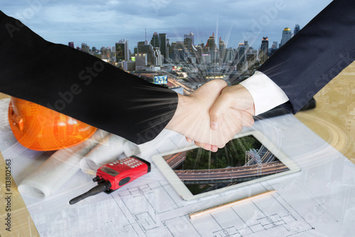 Double Exposure of handchake. Teamwork for success of the business