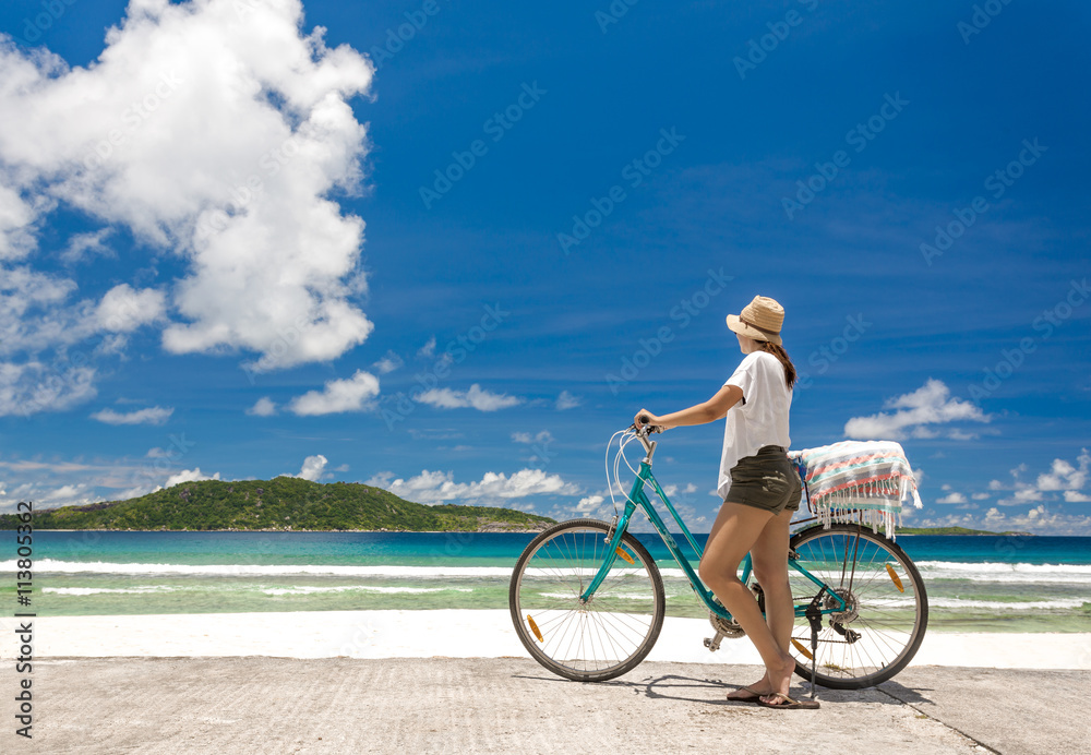 Woman ride along The Beach