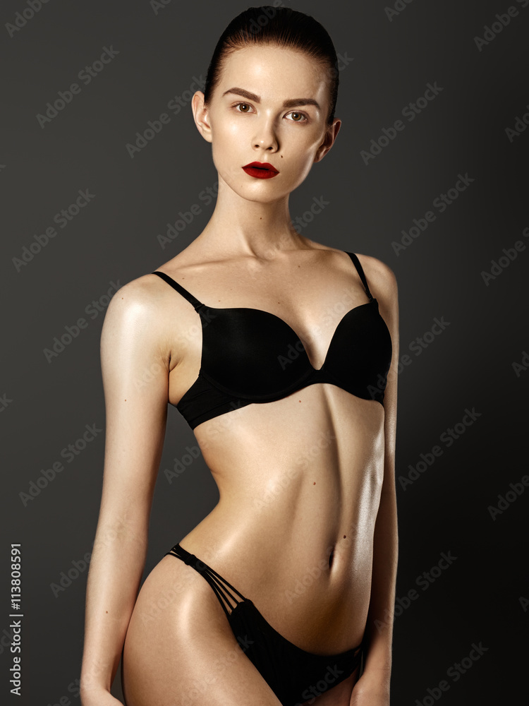 Sensual lady posing in black sexy lingerie. Very sexy brunette Stock Photo  | Adobe Stock