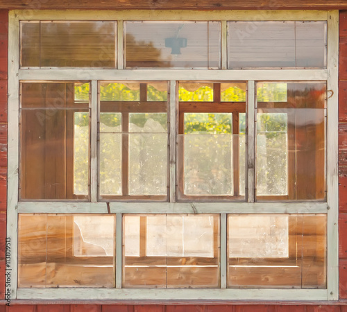 glassy window in cabin  tacky country old wooden small house
