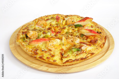 Seafood pizza on a wooden tray.
