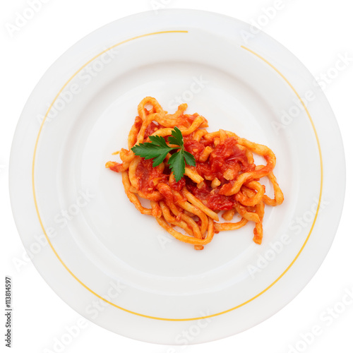 Traditional Tuscan pici pasta with tomato sauce