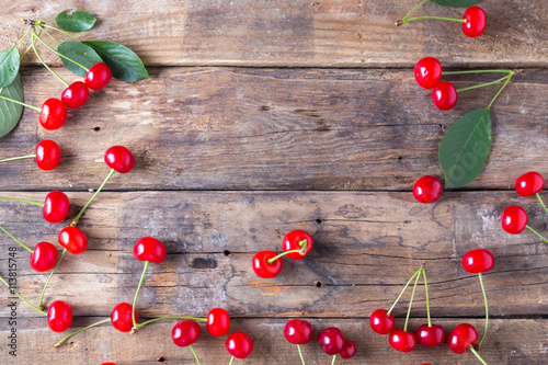 Cherries on a wooden background with copy space 