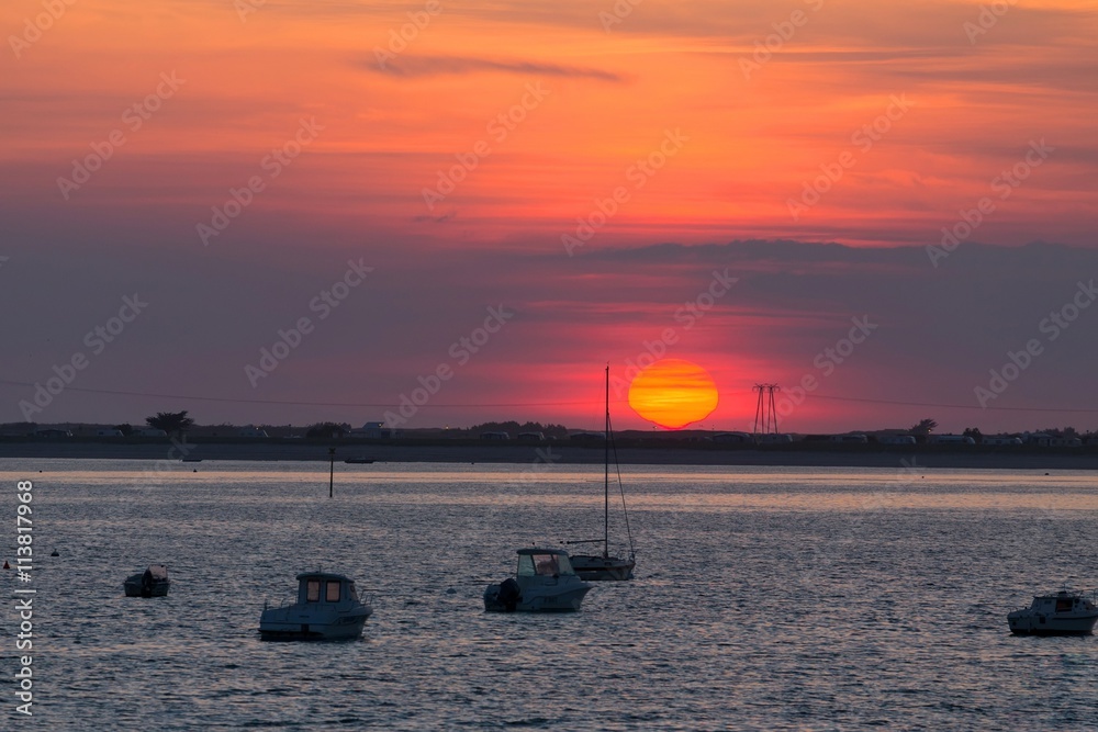 Red sunset over Carnac beach