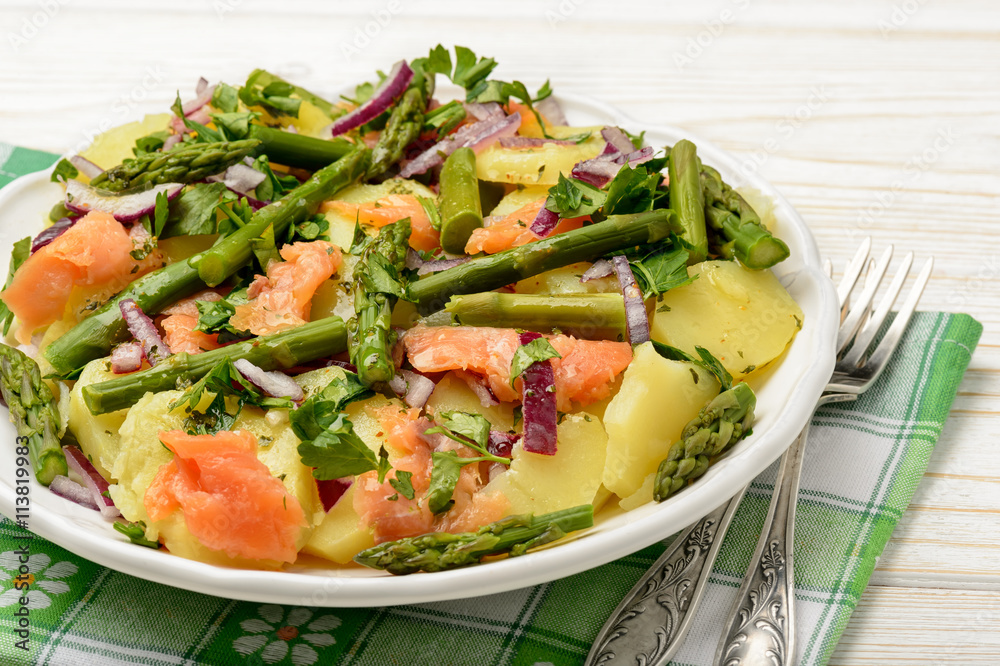 Delicious salad wit green asparagus, smoked salmon and potatoes. Delicious salad wit green asparagus, smoked salmon and potatoes.